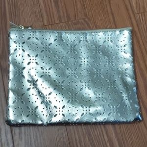 Gold cutout makeup bag